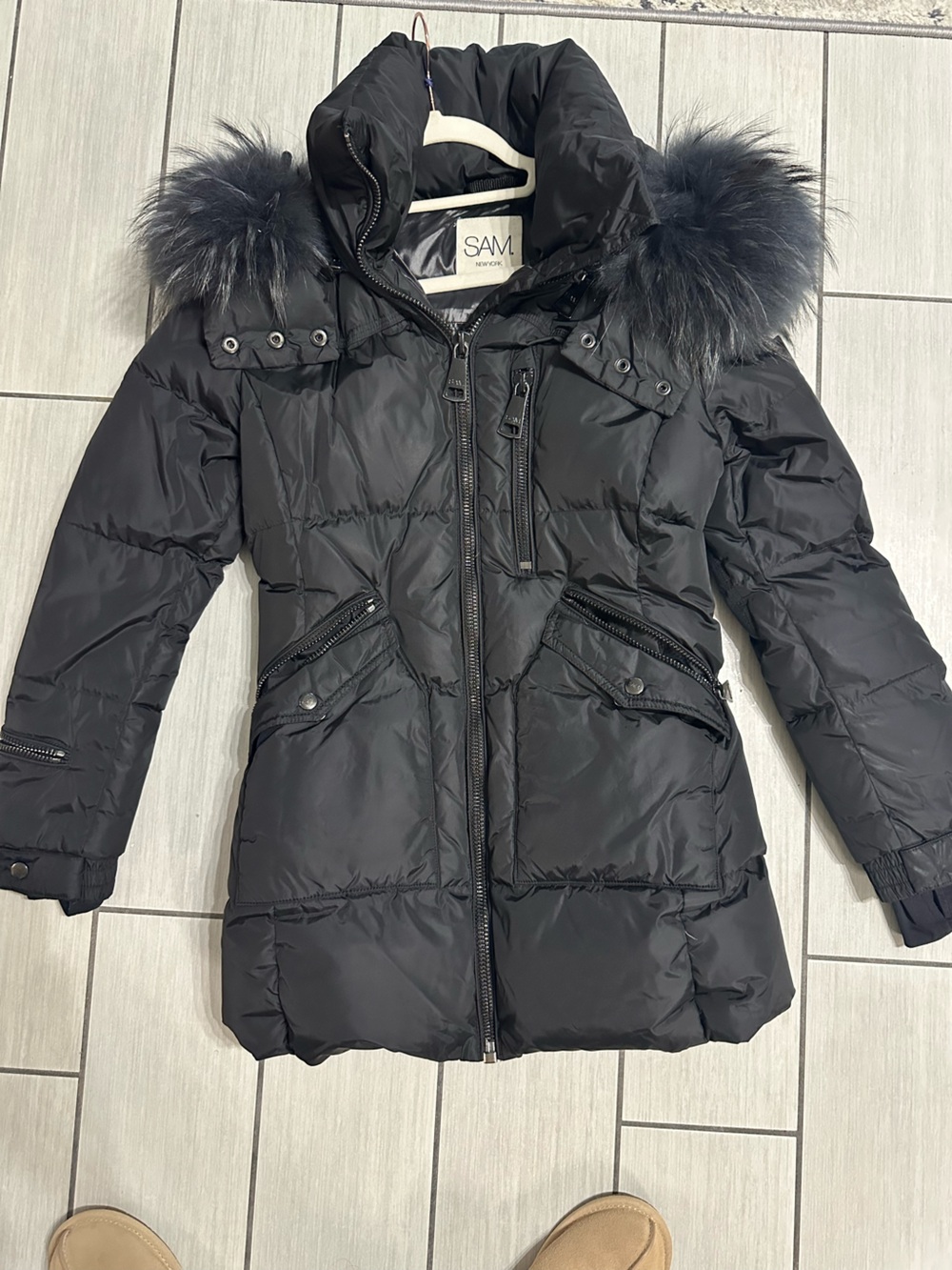 SAM. Black Quilted Long Puffer Coat with Faux Fur Trim